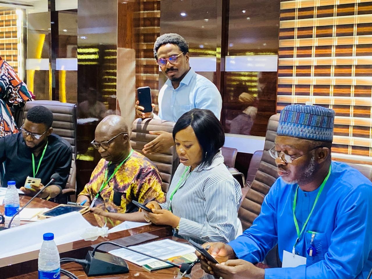 Zimedy consultants reviewing customer service training materials