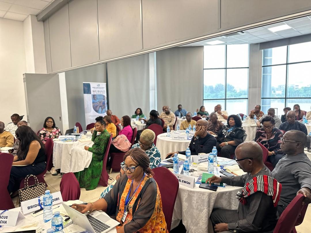 Zimedy consultants delivering a training session to a full room of attendees